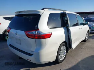 2016 Toyota Sienna XLE with VIN 5TDYK3DC6GS758189, listed as a IAAI auction lot 41598251 with 129,050 mi miles and . Bid and sale history available at DreamBid. Image 4.
