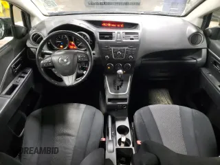 2012 Mazda 5 Touring with VIN JM1CW2CLXC0114623, listed as a Copart auction lot 52036475 with 149,589 mi miles and Salvage Title. Bid and sale history available at DreamBid. Image 8.