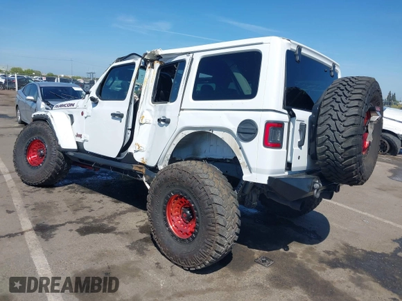 2018 Jeep Wrangler Unlimited Rubicon with VIN 1C4HJXFGXJW110629, listed as a IAAI auction lot 42141572 with 65,973 mi miles and . Bid and sale history available at DreamBid. Image 3.