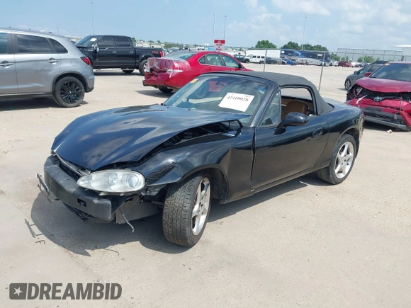 2002 Mazda MX-5 Miata Cloth with VIN JM1NB353520221312, listed as a IAAI auction lot 42410028 with 99,375 mi miles and . Bid and sale history available at DreamBid. Image 2.