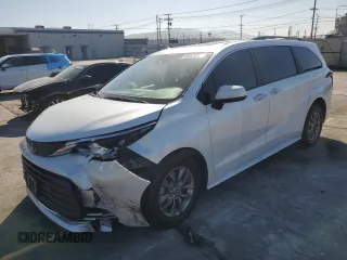 2023 Toyota Sienna XLE with VIN 5TDJSKFCXPS089790, listed as a Copart auction lot 55841085 with 94,241 mi miles and Salvage title. Bid and sale history available at DreamBid. Image 1.