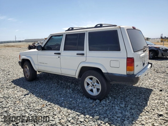 2000 Jeep Cherokee with VIN 1J4FT48S6YL152495, listed as a Copart auction lot 60627965 with 196,086 mi miles and Salvage title. Bid and sale history available at DreamBid. Image 2.