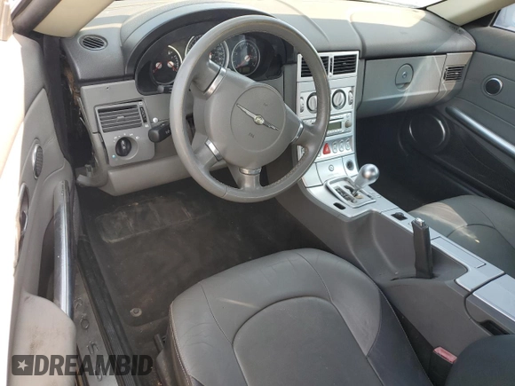 2005 Chrysler Crossfire Limited с VIN 1C3AN65L95X037773, выставлен на аукционе Copart как лот 59632735 с пробегом Не указан миль и Списание • Salvage title. История ставок и продаж доступна на DreamBid. Изображение 8.