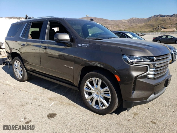 2021 Chevrolet Tahoe High Country with VIN 1GNSCTKL8MR113020, listed as a Copart auction lot 73131364 with 66,639 mi miles and Salvage Title. Bid and sale history available at carsss.com. Image 4.