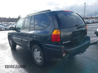 2003 GMC Envoy SLT with VIN 1GKDT13S732283859, listed as a IAAI auction lot 41219105 with 172,953 mi miles. Bid and sale history available at carsss.com. Image 3.