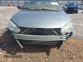 2005 Chrysler Sebring Touring z VIN 1C3EL55R25N567343, wystawiony jako IAAI lot #42447317 z przebiegiem Nie podano mil oraz . Historia ofert i sprzedaży dostępna na DreamBid. Obrazek 6.