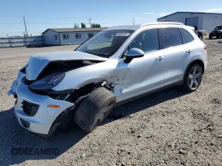 2016 Porsche Cayenne S E-Hybrid with VIN WP1AE2A22GLA64260, listed as a Copart auction lot 59086555 with 99,950 mi miles and Salvage title. Bid and sale history available at DreamBid. Image 1.