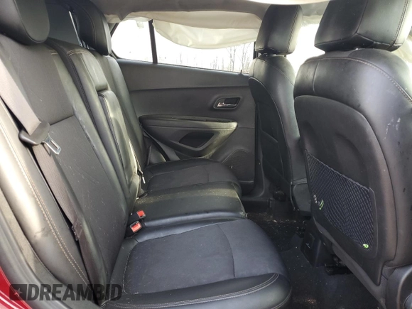 2020 Chevrolet Trax LT z VIN 3GNCJLSB8LL254659, wystawiony jako Copart lot #52303985 z przebiegiem 68 833 mil mil oraz Nie do naprawy. Historia ofert i sprzedaży dostępna na DreamBid. Obrazek 11.