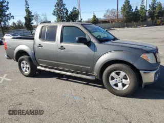 2009 Nissan Frontier SE with VIN 1N6AD07U49C405420, listed as a Copart auction lot 41983545 with 203,700 mi miles and Salvage title. Bid and sale history available at DreamBid. Image 4.