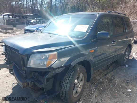 2006 Honda Pilot EX-L with VIN 2HKYF18596H500645, listed as a IAAI auction lot 41749033 with 242,599 mi miles. Bid and sale history available at carsss.com. Image 2.