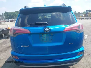 2018 Toyota RAV4 XLE with VIN JTMWFREVXJJ751586, listed as a IAAI auction lot 42586337 with 55,821 mi miles and . Bid and sale history available at DreamBid. Image 16.