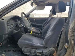 1992 Nissan Maxima z VIN JN1HJ01F1NT007180, wystawiony jako Copart lot #71271334 z przebiegiem 252 299 mil mil oraz Tytuł czysty. Historia ofert i sprzedaży dostępna na DreamBid. Obrazek 7.