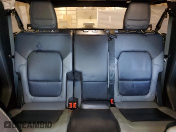 2021 Ford Bronco z VIN 1FMEE5DHXMLA92853, wystawiony jako Copart lot #51822135 z przebiegiem 34 894 mil mil oraz Szkoda całkowita • Salvage title. Historia ofert i sprzedaży dostępna na DreamBid. Obrazek 10.