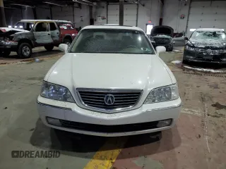 2004 Acura RL w/Navigation System with VIN JH4KA96644C004559, listed as a Copart auction lot 86161794 with 101,379 mi miles and Salvage Title. Bid and sale history available at carsss.com. Image 5.
