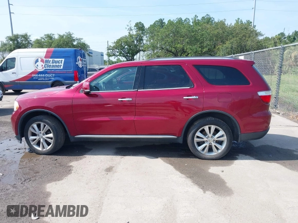 2013 Dodge Durango Crew z VIN 1C4RDJDG6DC672934, wystawiony jako IAAI lot #42542073 z przebiegiem 181 812 mil mil oraz . Historia ofert i sprzedaży dostępna na DreamBid. Obrazek 14.