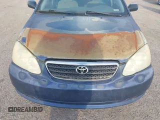 2005 Toyota Corolla CE with VIN 1NXBR32E25Z563569, listed as a IAAI auction lot 42100384 with 243,610 mi miles and . Bid and sale history available at DreamBid. Image 6.