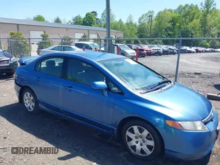 2006 Honda Civic LX with VIN JHMFA16586S000128, listed as a IAAI auction lot 42138350 with 127,253 mi miles and . Bid and sale history available at DreamBid. Image 1.