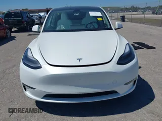 2025 Tesla Model Y Long Range with VIN 7SAYGDED6SF234278, listed as a IAAI auction lot 41781695 with 1,168 mi miles and . Bid and sale history available at DreamBid. Image 11.