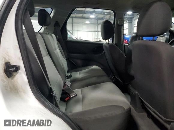 2004 Ford Escape XLS with VIN 1FMYU92164KA28697, listed as a Copart auction lot 87878445 with 156,767 mi miles and Salvage Title. Bid and sale history available at DreamBid. Image 11.
