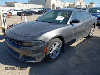 2023 Dodge Charger SXT with VIN 2C3CDXBG1PH630916, listed as a IAAI auction lot 41962035 with 41,818 mi miles and . Bid and sale history available at DreamBid. Image 2.