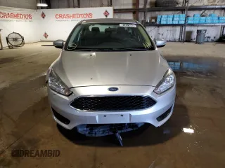 2016 Ford Focus SE z VIN 1FADP3F26GL247898, wystawiony jako Copart lot #57411665 z przebiegiem 134 708 mil mil oraz Czysty tytuł • Clean title. Historia ofert i sprzedaży dostępna na DreamBid. Obrazek 5.