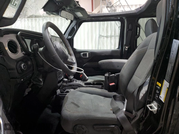 2024 Jeep Wrangler Sahara with VIN 1C4RJXP60RW257385, listed as a Copart auction lot 47660655 with 20,899 mi miles and Salvage title. Bid and sale history available at DreamBid. Image 7.