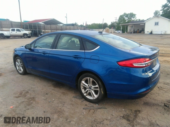 2018 Ford Fusion SE with VIN 3FA6P0HD1JR186717, listed as a IAAI auction lot 42076519 with 141,478 mi miles and . Bid and sale history available at DreamBid. Image 3.