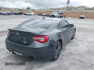 2016 Scion FR-S with VIN JF1ZNAA11G9708176, listed as a IAAI auction lot 41787608 with 82,815 mi miles. Bid and sale history available at carsss.com. Image 4.