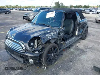 2010 MINI Convertible with VIN WMWMR3C54ATU96904, listed as a IAAI auction lot 39151247 with 109,019 mi miles and . Bid and sale history available at DreamBid. Image 6.