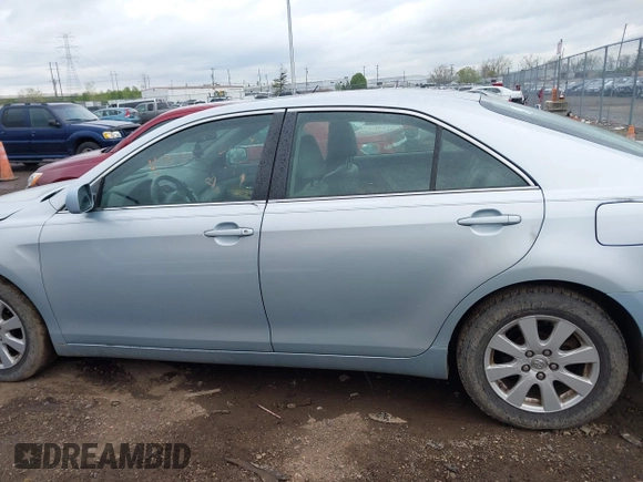 2007 Toyota Camry LE with VIN JTNBK46K873006572, listed as a IAAI auction lot 42083419 with 203,605 mi miles and . Bid and sale history available at DreamBid. Image 14.