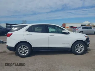2019 Chevrolet Equinox LT z VIN 2GNAXKEVXK6256700, wystawiony jako IAAI lot #41655963 z przebiegiem 80 294 mil mil oraz . Historia ofert i sprzedaży dostępna na DreamBid. Obrazek 14.