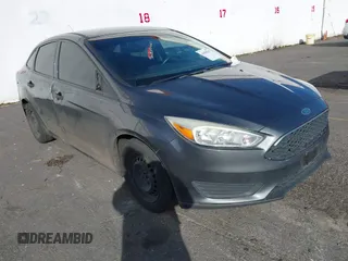 2017 Ford Focus S z VIN 1FADP3E29HL303741, wystawiony jako IAAI lot #41558257 z przebiegiem 123 682 mil mil oraz . Historia ofert i sprzedaży dostępna na DreamBid. Obrazek 1.
