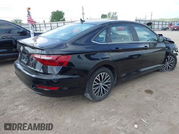 2021 Volkswagen Jetta S with VIN 3VWC57BU3MM049961, listed as a IAAI auction lot 41933307 with 74,891 mi miles and . Bid and sale history available at DreamBid. Image 4.