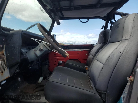 1990 Jeep Wrangler with VIN 2J4FY29T5LJ537896, listed as a Copart auction lot 57021295 with 143,753 mi miles and Clean title. Bid and sale history available at DreamBid. Image 7.