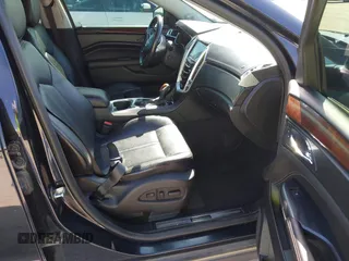 2013 Cadillac SRX Performance Collection with VIN 3GYFNHE35DS548632, listed as a IAAI auction lot 41990670 with 98,659 mi miles. Bid and sale history available at carsss.com. Image 5.