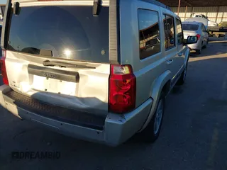 2008 Jeep Commander Sport z VIN 1J8HH48K48C213531, wystawiony jako IAAI lot #40878062 z przebiegiem 152 788 mil mil oraz . Historia ofert i sprzedaży dostępna na DreamBid. Obrazek 4.