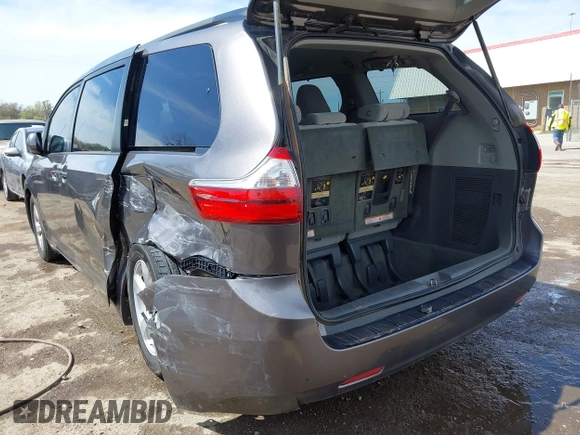 2015 Toyota Sienna LE AAS with VIN 5TDKK3DC5FS575077, listed as a IAAI auction lot 41941483 with 134,265 mi miles. Bid and sale history available at carsss.com. Image 3.