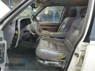 1993 Ford Explorer Eddie Bauer z VIN 1FMDU34X2PUE07332, wystawiony jako Copart lot #81618824 z przebiegiem 15 484 mil mil oraz Szkoda całkowita • Salvage title. Historia ofert i sprzedaży dostępna na DreamBid. Obrazek 7.