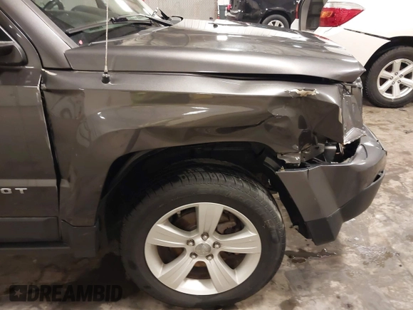 2016 Jeep Patriot High Altitude with VIN 1C4NJRFB7GD657607, listed as a IAAI auction lot 42346923 with 111,757 mi miles and . Bid and sale history available at DreamBid. Image 18.