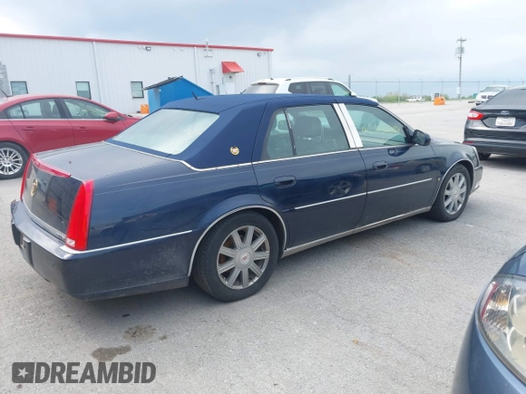 2007 Cadillac DTS Luxury I with VIN 1G6KD57Y47U201637, listed as a IAAI auction lot 42104749 with 203,485 mi miles and . Bid and sale history available at DreamBid. Image 4.