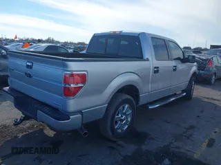 2014 Ford F-150 XL with VIN 1FTEW1CM9EFC50155, listed as a IAAI auction lot 41302506 with 212,439 mi miles. Bid and sale history available at carsss.com. Image 4.