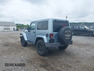 2012 Jeep Wrangler Arctic with VIN 1C4AJWBG7CL148325, listed as a IAAI auction lot 39943602 with 86,625 mi miles and . Bid and sale history available at DreamBid. Image 3.