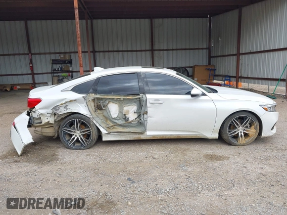 2021 Honda Accord Touring z VIN 1HGCV2F92MA020218, wystawiony jako IAAI lot #41827116 z przebiegiem 122 696 mil mil oraz . Historia ofert i sprzedaży dostępna na DreamBid. Obrazek 13.