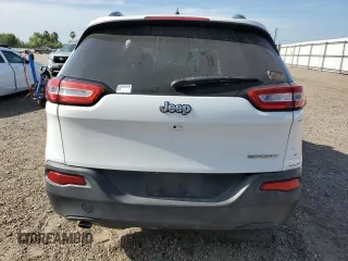 2016 Jeep Cherokee Altitude with VIN 1C4PJLAB2GW291427, listed as a Copart auction lot 52993635 with 129,912 mi miles and Salvage title. Bid and sale history available at DreamBid. Image 6.