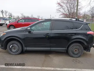 2016 Toyota RAV4 LE with VIN 2T3BFREV3GW447802, listed as a IAAI auction lot 41985438 with 213,247 mi miles. Bid and sale history available at carsss.com. Image 14.