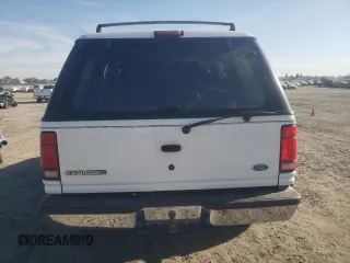 1994 Ford Explorer Eddie Bauer z VIN 1FMDU34X3RUE51150, wystawiony jako Copart lot #72376214 z przebiegiem 176 319 mil mil oraz Szkody całkowita. Historia ofert i sprzedaży dostępna na DreamBid. Obrazek 6.