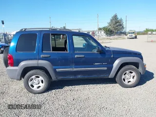 2003 Jeep Liberty Sport with VIN 1J4GL48K83W663248, listed as a IAAI auction lot 42056561 with 161,652 mi miles. Bid and sale history available at carsss.com. Image 13.