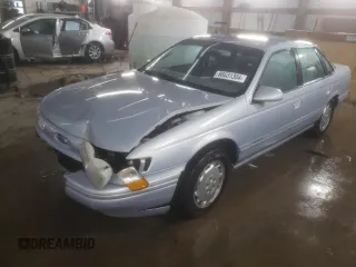 1994 Ford Taurus GL z VIN 1FALP52U5RG255078, wystawiony jako Copart lot #86631304 z przebiegiem 86 662 mil mil oraz Szkoda całkowita • Salvage title. Historia ofert i sprzedaży dostępna na DreamBid. Obrazek 1.