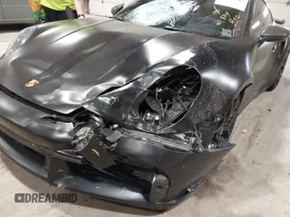2024 Porsche 911 Turbo z VIN WP0AD2A96RS252418, wystawiony jako IAAI lot #42309087 z przebiegiem 21 824 mil mil oraz . Historia ofert i sprzedaży dostępna na DreamBid. Obrazek 6.