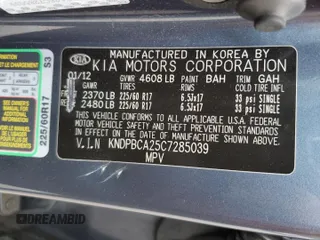2012 Kia Sportage LX with VIN KNDPBCA25C7285039, listed as a Copart auction lot 52620735 with 197,305 mi miles and Salvage title. Bid and sale history available at DreamBid. Image 14.